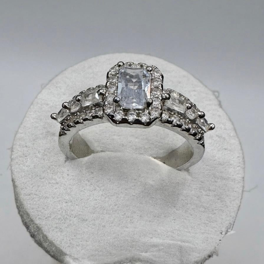 Vintage Emerald-Cut Silver Halo Engagement Ring with Marquise Accent Band