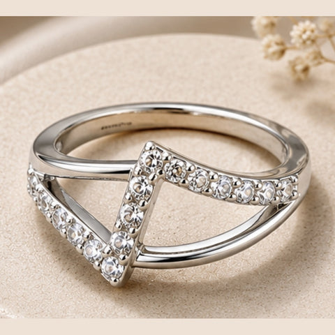 Crystal Infinity Twist Ring – Elegant Silver-Tone Zircon Statement Ring