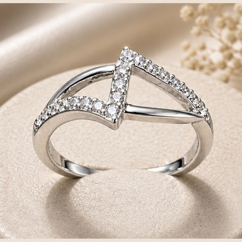 Crystal Infinity Twist Ring – Elegant Silver-Tone Zircon Statement Ring